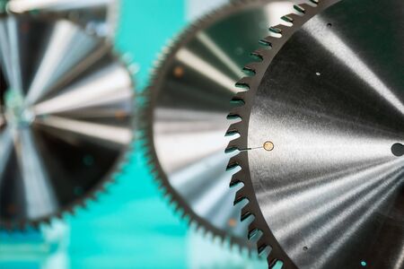 cutting disks and cutters of the woodworking machine on a sawmillの写真素材