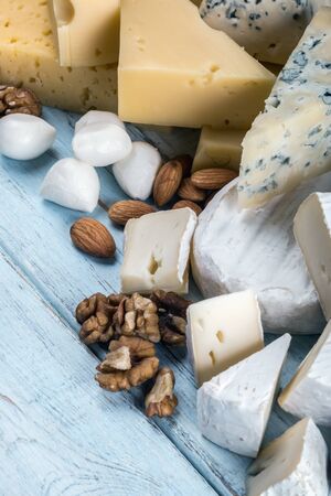 different varieties and types of cheese with fruit, nuts  の写真素材