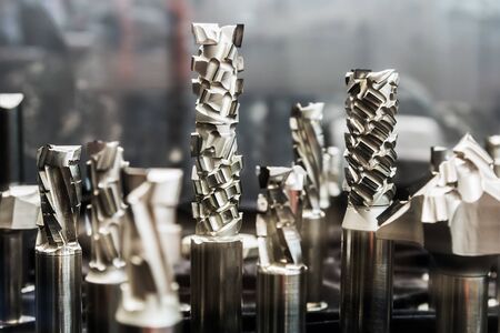 drills on metal of different length and diameter on a shop counter. Shallow depth of fieldの写真素材