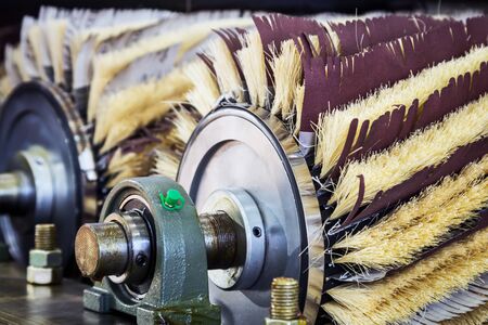 grinding wheels with sandpaper and brushes for grinding and finishing worksの写真素材