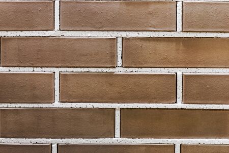 imitation of brickwork in a construction store or exhibition. The background of bricksの写真素材