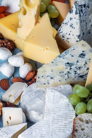different varieties and types of cheese with fruit, nutsの写真素材