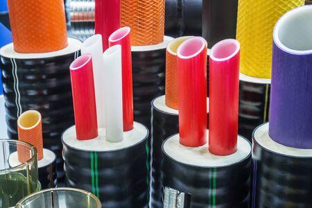 different types and samples of plastic pipelines and pipes for heating and water supply linesの写真素材
