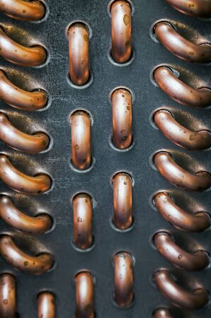 copper tubes in the cooling system of climate equipment. copper pipes for connectionの写真素材