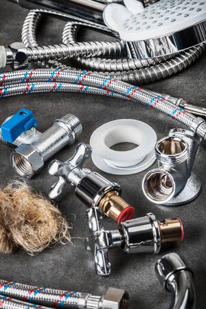 different plumbing fixtures for use in the bathroom and toilet room, in the kitchenの写真素材
