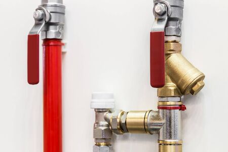 distribution of pipes in the water supply system. Coarse filters and ball valves are installedの写真素材