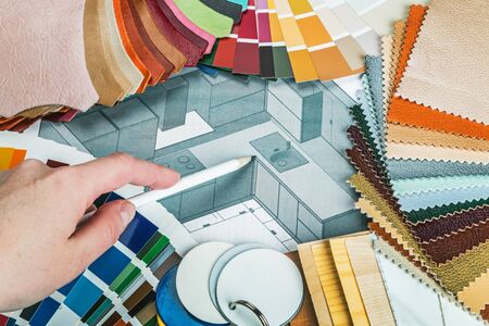 select a color from the color sample pallets in the designers workspace. choice of materials, textures and colors for room renovationの写真素材