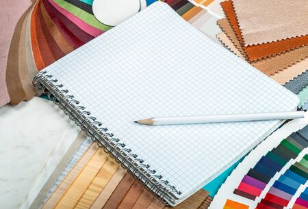 choice of materials, textures and colors for room renovation. White Notepad with space to write your textの写真素材
