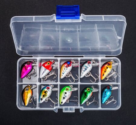 small fishing lures for catching predatory fish in a box. Wobblers for fishingの写真素材