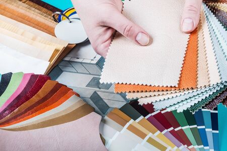 select a color from the color sample pallets in the designers workspace. choice of materials, textures and colors for room renovationの写真素材