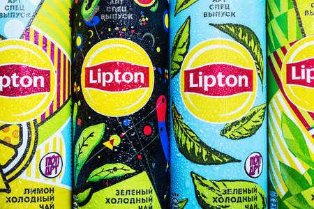 Moscow, Russia-June 16, 2020: different types of cold Lipton tea in a different design aluminum can. Lipton the tea trademark registered by Thomas Lipton is owned by Unileverのeditorial素材