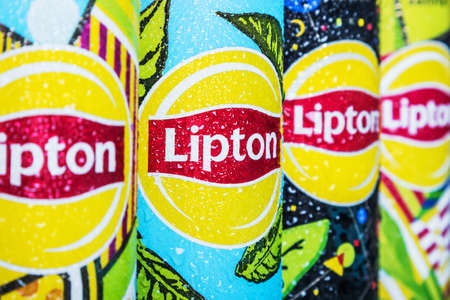 Moscow, Russia-June 16, 2020: different types of cold Lipton tea in a different design aluminum can. Lipton the tea trademark registered by Thomas Lipton is owned by Unileverのeditorial素材