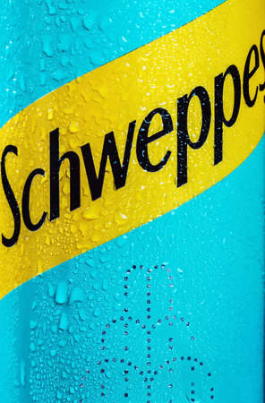 Moscow, Russia-June 16, 2020: Schweppes carbonated drink in an aluminum can, background. Schweppes is a brand of soft drinks founded by Jacob Schwepp in 1783のeditorial素材