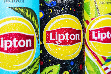 Moscow, Russia-June 16, 2020: different types of cold Lipton tea in a different design aluminum can. Lipton the tea trademark registered by Thomas Lipton is owned by Unileverのeditorial素材