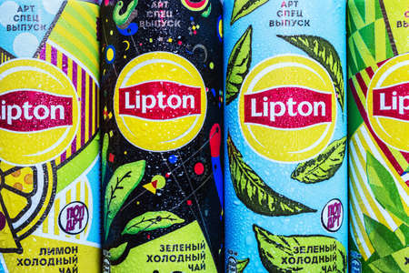 Moscow, Russia-June 16, 2020: different types of cold Lipton tea in a different design aluminum can. Lipton the tea trademark registered by Thomas Lipton is owned by Unileverのeditorial素材