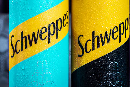 Moscow, Russia-June 16, 2020: Schweppes carbonated drinks in aluminum cans with different flavors. Schweppes is a brand of soft drinks founded by Jacob Schwepp in 1783のeditorial素材