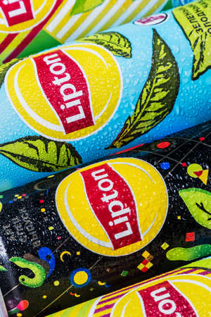 Moscow, Russia-June 16, 2020: different types of cold Lipton tea in a different design aluminum can. Lipton the tea trademark registered by Thomas Lipton is owned by Unileverのeditorial素材
