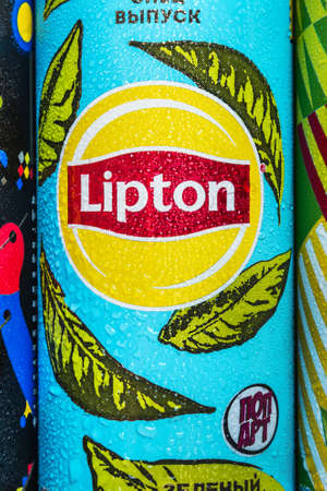 Moscow, Russia-June 16, 2020: different types of cold Lipton tea in a different design aluminum can. Lipton the tea trademark registered by Thomas Lipton is owned by Unileverのeditorial素材