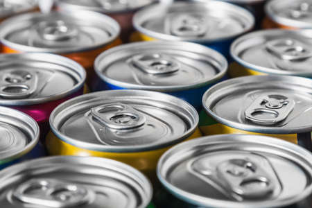 aluminum cans with carbonated water, energy drinks or beer. Background of aluminum cansの写真素材