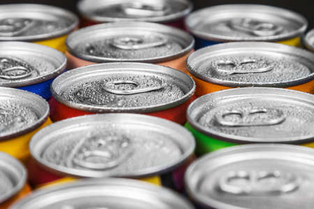 aluminum cans with carbonated water, energy drinks or beer. Background of aluminum cansの写真素材