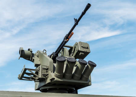 heavy machine gun mounted on the turret of a tank or infantry fighting vehicleの写真素材