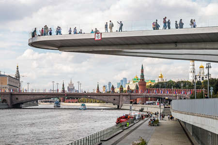 Moscow, Russia-August 23, 2020: tourists and people view Moscow from the floating bridge in Zaryadye Parkのeditorial素材
