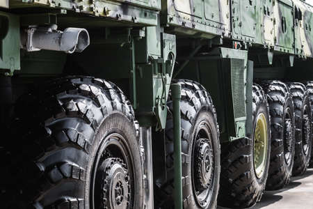 large wheels with deep tread rubber on military vehiclesの写真素材