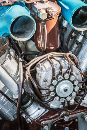 old diesel engine with injectors and copper fuel lines from military or construction equipmentの写真素材