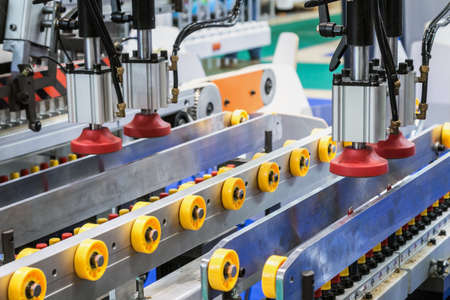 the drilling and welding machine is located in the wood and lumber processing shop
