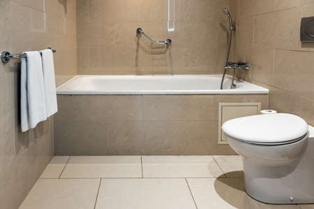 bathroom with toilet and bath in the hotel roomの写真素材