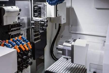 CNC lathe machine or Turning machine drilling the steel rodの写真素材