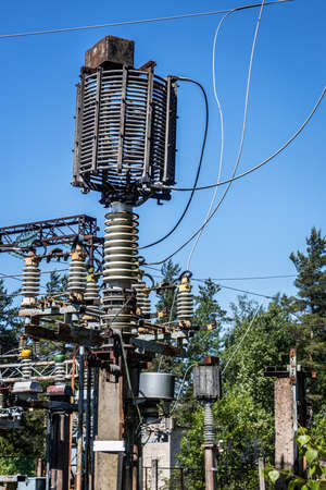 old abandoned power plant with rusty wires, structures,