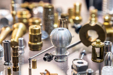 different shapes and sizes of parts turned on a lathe or milling machineの写真素材
