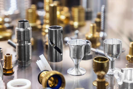 different shapes and sizes of parts turned on a lathe or milling machineの写真素材