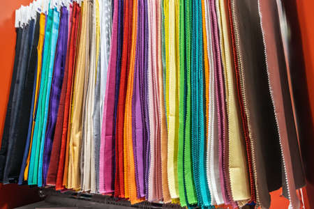 fabric made of different materials, shapes and colors for the production of clothing in an atelierの写真素材