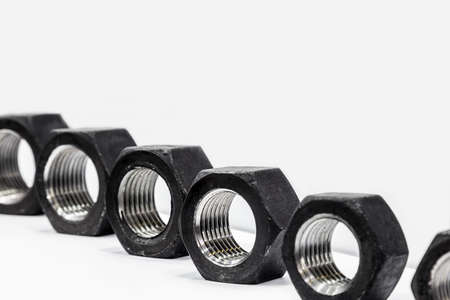 nuts of different diameters on a light backgroundの写真素材