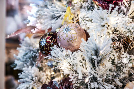 beautifuldecorations of flowers and Christmas balls on the Christmas treeの写真素材