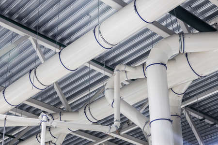 Industrial factory ceiling with ventilation system and air ventsの写真素材