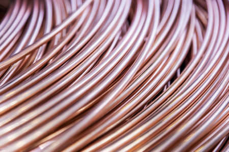background of a large coil of copper tubeの写真素材