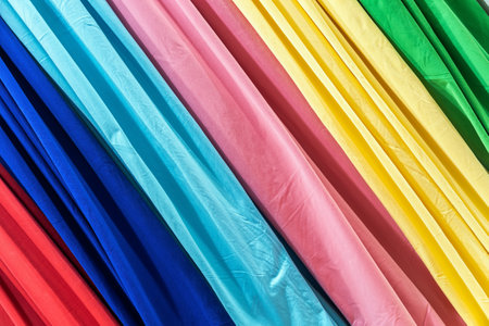 fabrics made of different materials, shades and colors for the production of clothingの写真素材