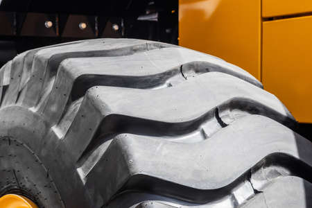 The protector of a large rubber wheel. Rubber tire from the tipper