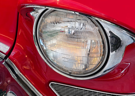 The headlight of the retro car is redの写真素材