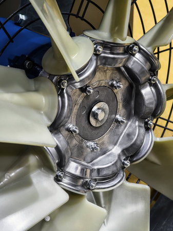 Close view of a fan mechanism showcasing detailed engineering and design in a machinery setupの写真素材