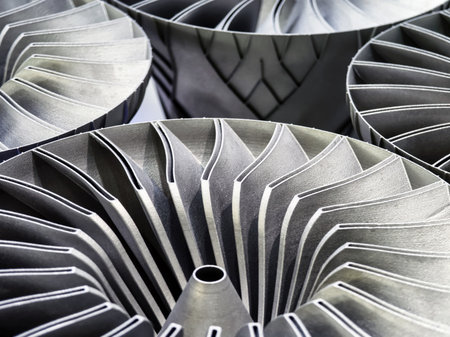 Innovative 3D printing technology showcases intricate metal components manufactured with precision and modern techniquesの写真素材