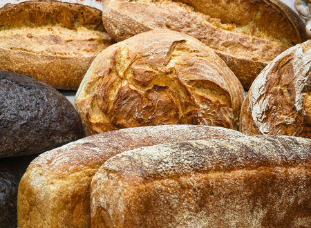Fresh baked breads on display at a local bakery in the morning hours of a busy city