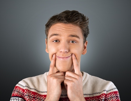 Humor, Making a Face, Smiling.の写真素材