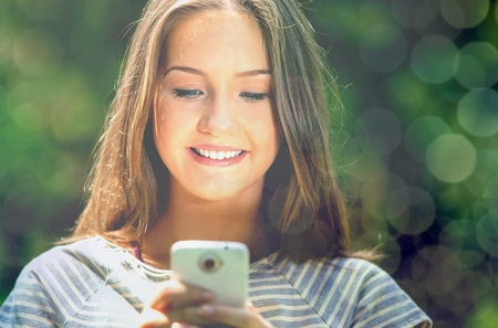 Mobile Phone, Text Messaging, Women.の写真素材