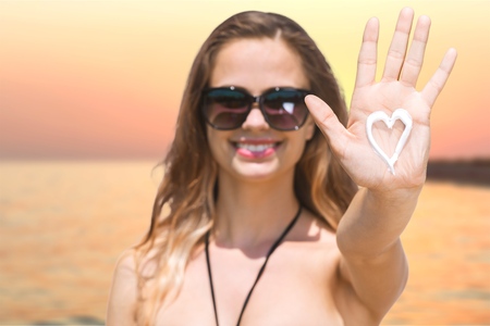 Sunburn, heart, closeup.の写真素材