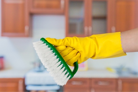 Hand, yellow, scrub.