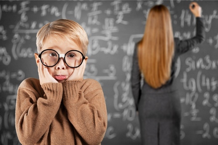 Stressed boy, woman, displeasure.の写真素材